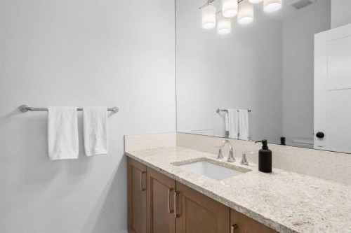 99 Ridge View Close, Cochrane, AB - Indoor Photo Showing Bathroom
