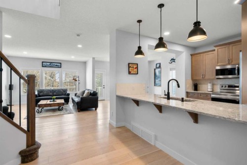 99 Ridge View Close, Cochrane, AB - Indoor Photo Showing Kitchen With Upgraded Kitchen