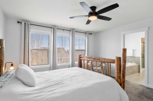 99 Ridge View Close, Cochrane, AB - Indoor Photo Showing Bedroom