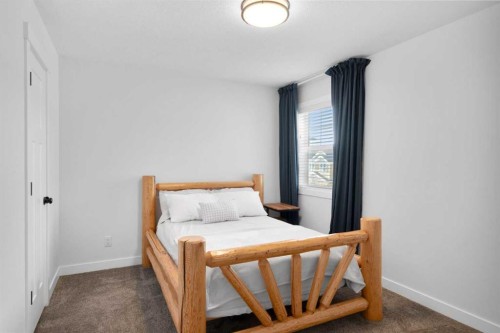 99 Ridge View Close, Cochrane, AB - Indoor Photo Showing Bedroom