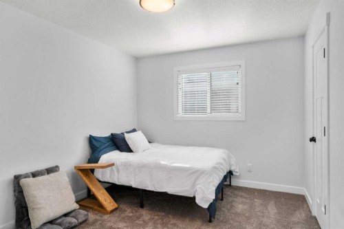 99 Ridge View Close, Cochrane, AB - Indoor Photo Showing Bedroom