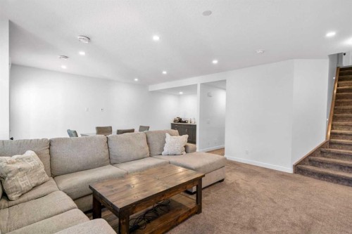99 Ridge View Close, Cochrane, AB - Indoor Photo Showing Living Room