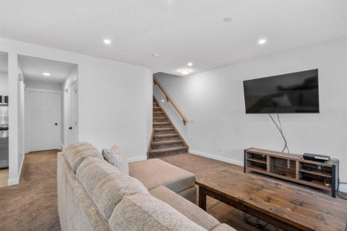 99 Ridge View Close, Cochrane, AB - Indoor Photo Showing Living Room