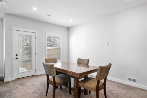 99 Ridge View Close, Cochrane, AB - Indoor Photo Showing Dining Room