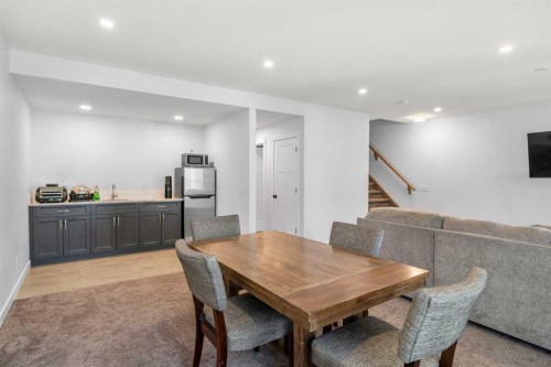 99 Ridge View Close, Cochrane, AB - Indoor Photo Showing Dining Room