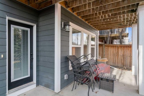 99 Ridge View Close, Cochrane, AB - Outdoor With Deck Patio Veranda With Exterior