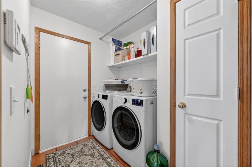 197 Arbour Stone Close Nw, Calgary, AB - Indoor Photo Showing Laundry Room