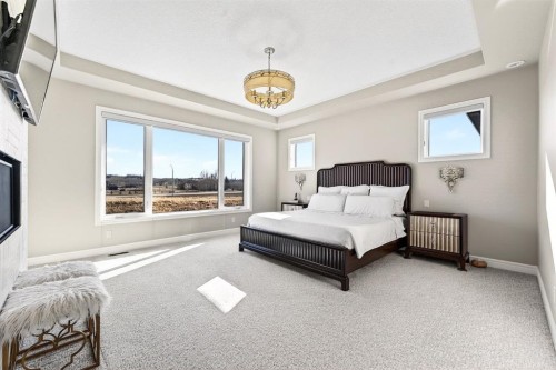 33 Waters Edge Drive, Heritage Pointe, AB - Indoor Photo Showing Bedroom