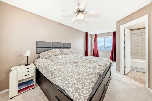 273 Tuscany Springs Way Nw, Calgary, AB - Indoor Photo Showing Bedroom