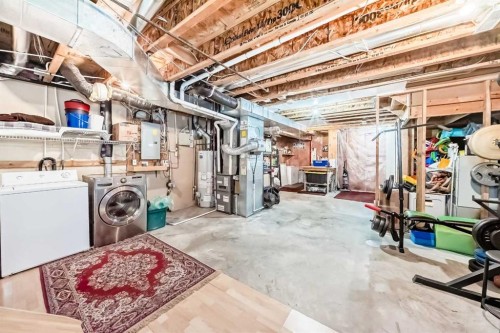273 Tuscany Springs Way Nw, Calgary, AB - Indoor Photo Showing Laundry Room