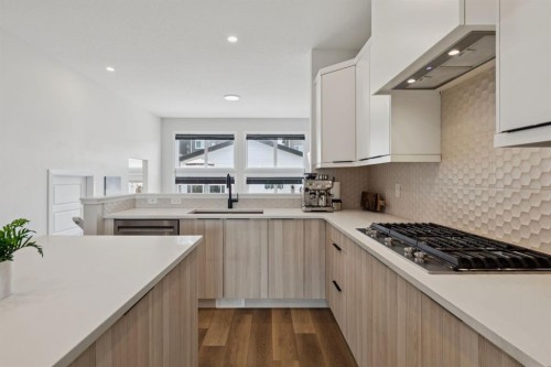 87 Aquila Way Nw, Calgary, AB - Indoor Photo Showing Kitchen With Upgraded Kitchen