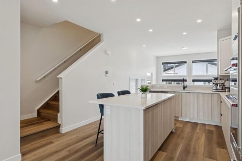 87 Aquila Way Nw, Calgary, AB - Indoor Photo Showing Kitchen With Upgraded Kitchen