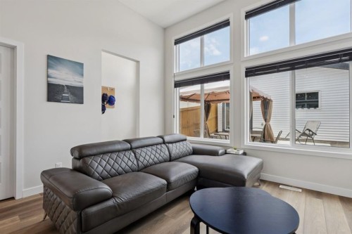 87 Aquila Way Nw, Calgary, AB - Indoor Photo Showing Living Room