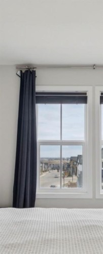 87 Aquila Way Nw, Calgary, AB - Indoor Photo Showing Other Room