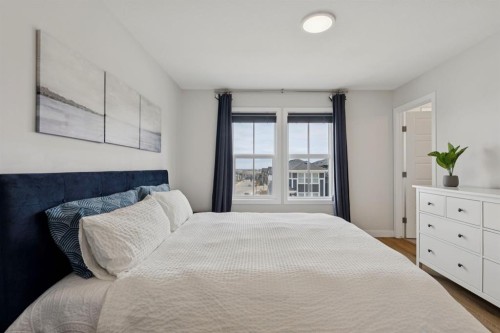 87 Aquila Way Nw, Calgary, AB - Indoor Photo Showing Bedroom