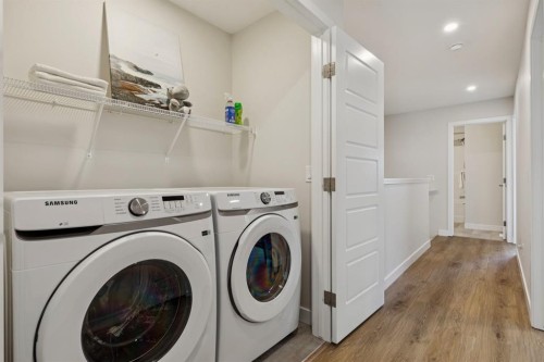 87 Aquila Way Nw, Calgary, AB - Indoor Photo Showing Laundry Room
