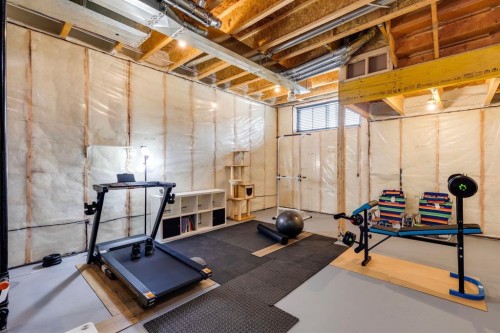 87 Aquila Way Nw, Calgary, AB - Indoor Photo Showing Basement
