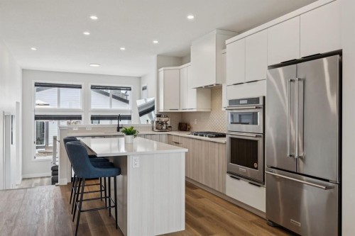 87 Aquila Way Nw, Calgary, AB - Indoor Photo Showing Kitchen With Upgraded Kitchen