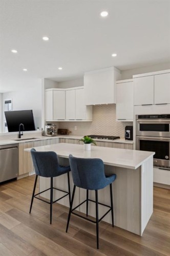 87 Aquila Way Nw, Calgary, AB - Indoor Photo Showing Kitchen With Upgraded Kitchen