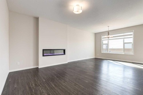 70 Howse Common Ne, Calgary, AB - Indoor With Fireplace