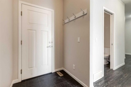 70 Howse Common Ne, Calgary, AB - Indoor Photo Showing Other Room