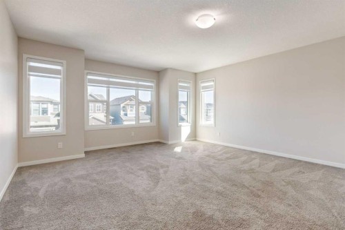 70 Howse Common Ne, Calgary, AB - Indoor Photo Showing Other Room