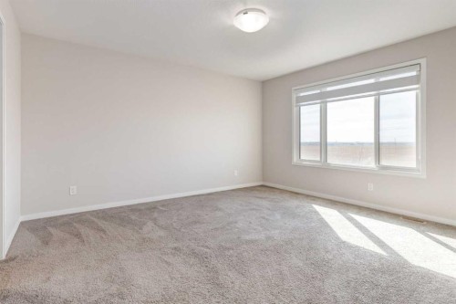 70 Howse Common Ne, Calgary, AB - Indoor Photo Showing Other Room