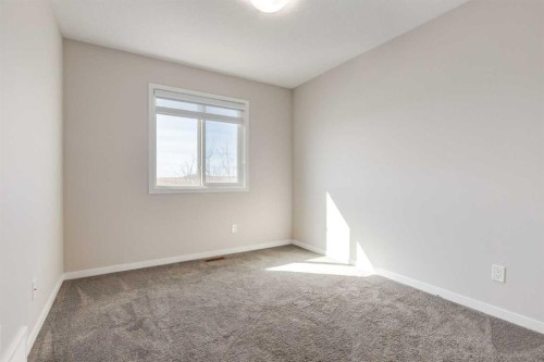 70 Howse Common Ne, Calgary, AB - Indoor Photo Showing Other Room