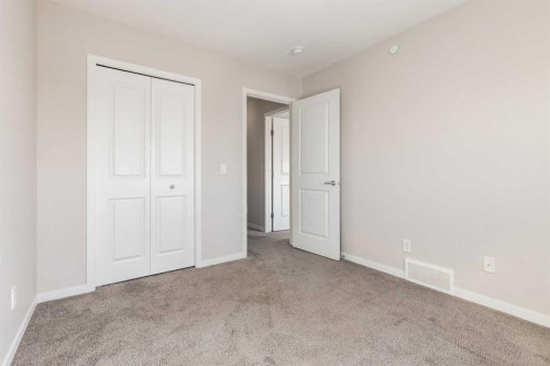 70 Howse Common Ne, Calgary, AB - Indoor Photo Showing Other Room
