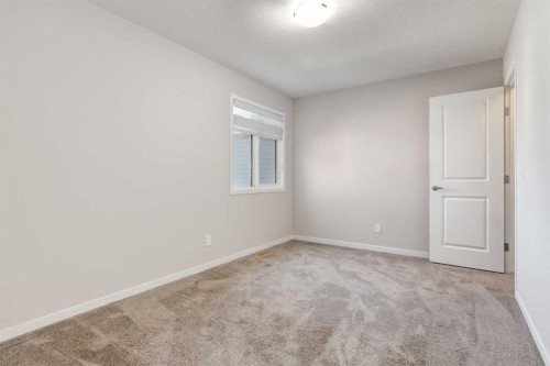 70 Howse Common Ne, Calgary, AB - Indoor Photo Showing Other Room
