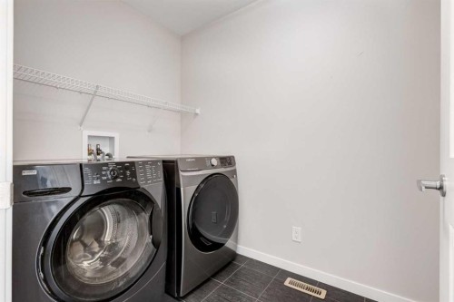 70 Howse Common Ne, Calgary, AB - Indoor Photo Showing Laundry Room