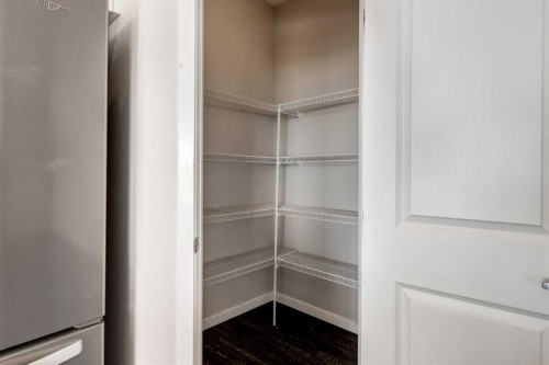 70 Howse Common Ne, Calgary, AB - Indoor Photo Showing Other Room