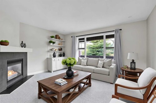 154 Everglen Rise Sw, Calgary, AB - Indoor Photo Showing Living Room With Fireplace