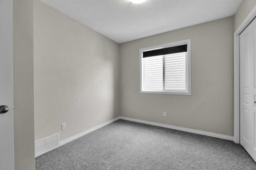 154 Everglen Rise Sw, Calgary, AB - Indoor Photo Showing Other Room