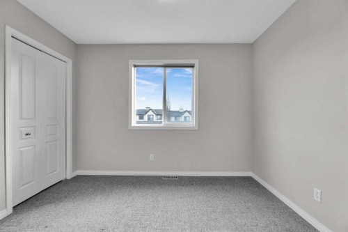 154 Everglen Rise Sw, Calgary, AB - Indoor Photo Showing Other Room