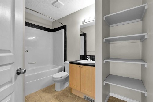 154 Everglen Rise Sw, Calgary, AB - Indoor Photo Showing Bathroom