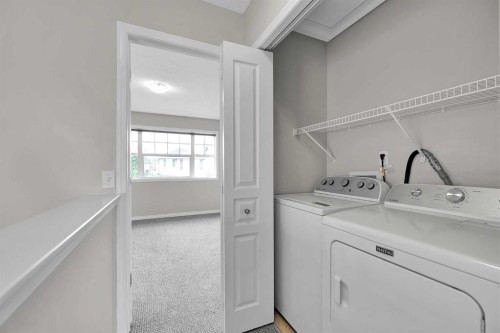 154 Everglen Rise Sw, Calgary, AB - Indoor Photo Showing Laundry Room