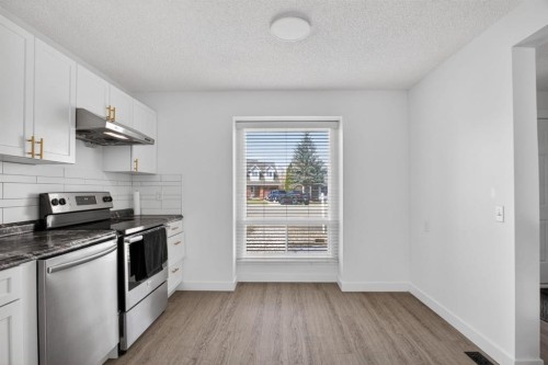 55 Falwood Place Ne, Calgary, AB - Indoor Photo Showing Kitchen