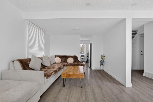 55 Falwood Place Ne, Calgary, AB - Indoor Photo Showing Living Room