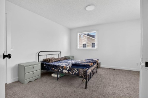 55 Falwood Place Ne, Calgary, AB - Indoor Photo Showing Bedroom