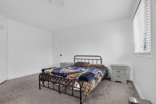 55 Falwood Place Ne, Calgary, AB - Indoor Photo Showing Bedroom