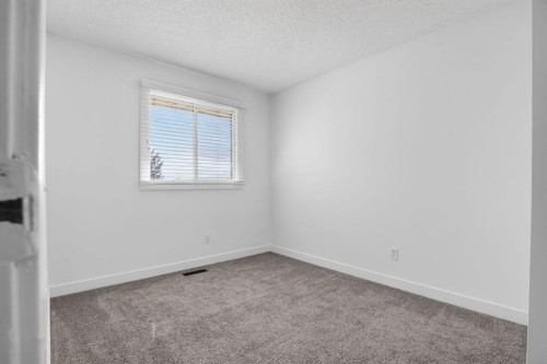 55 Falwood Place Ne, Calgary, AB - Indoor Photo Showing Other Room