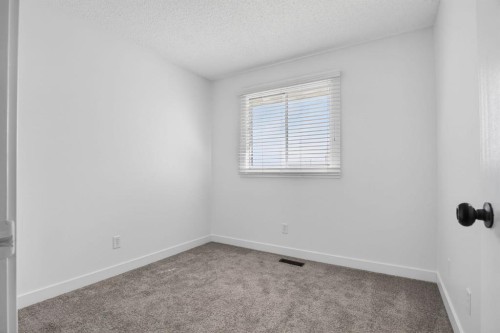 55 Falwood Place Ne, Calgary, AB - Indoor Photo Showing Other Room