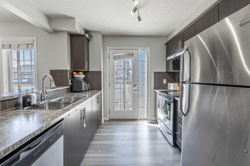 24 Cityscape Avenue Ne, Calgary, AB - Indoor Photo Showing Kitchen With Stainless Steel Kitchen With Double Sink