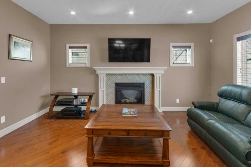 44 Mahogany Rise Se, Calgary, AB - Indoor Photo Showing Living Room With Fireplace