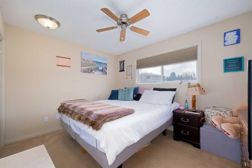 60 Doverview Place Se, Calgary, AB - Indoor Photo Showing Bedroom