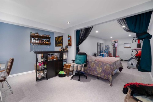 60 Doverview Place Se, Calgary, AB - Indoor Photo Showing Bedroom