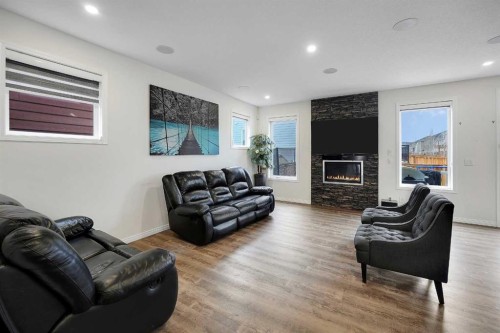 17 Yorkstone Way Sw, Calgary, AB - Indoor Photo Showing Living Room With Fireplace