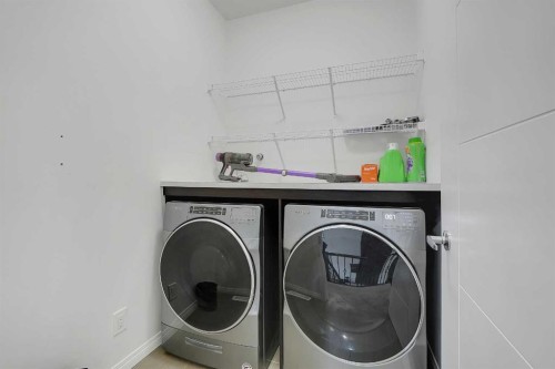17 Yorkstone Way Sw, Calgary, AB - Indoor Photo Showing Laundry Room