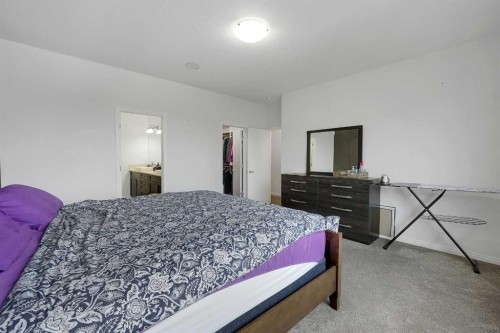 17 Yorkstone Way Sw, Calgary, AB - Indoor Photo Showing Bedroom